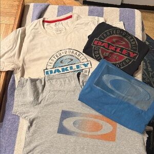 Oakley Short Sleeve Logo Tees in Cream, Gray, Blue & Black